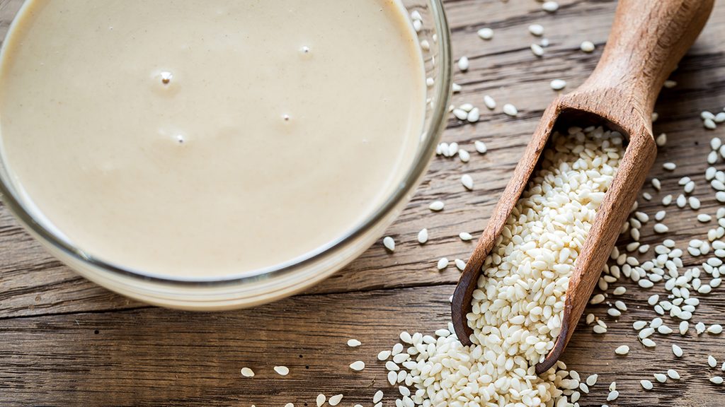 Bowl of tahini with sesame seeds