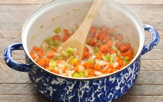 saute vegetables in a pot