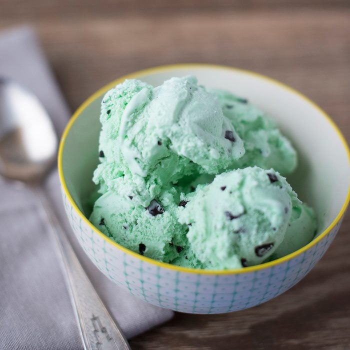 A delicious bowl of mint chocolate chip ice cream.