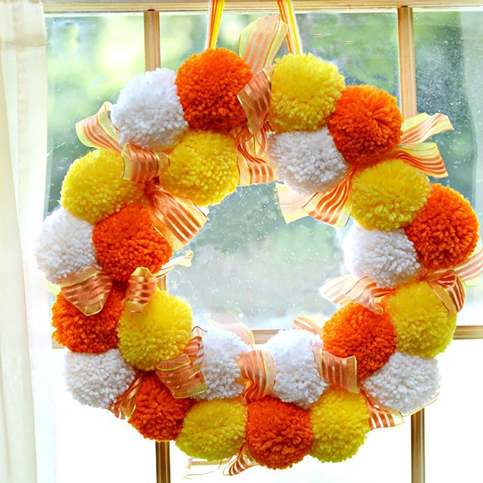 MAKE CANDY CORN POMPOM WREATHS!