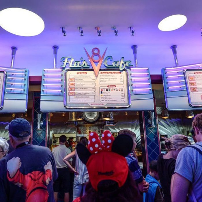 Diners wait in line at Flo"u2019s V8 Café in Cars Land at California Adventure in Anaheim, CA, on Thursday, July 5, 2018. (Photo by Jeff Gritchen/Orange County Register via Getty Images)