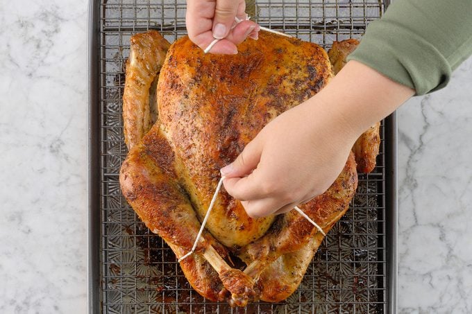 74640 Herb-Brined Turkey; 6b How-to Cook Turkey (lifting turkey)