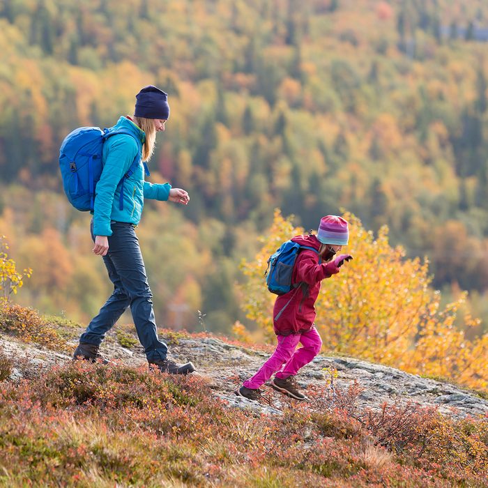 Mother with daughter hiking