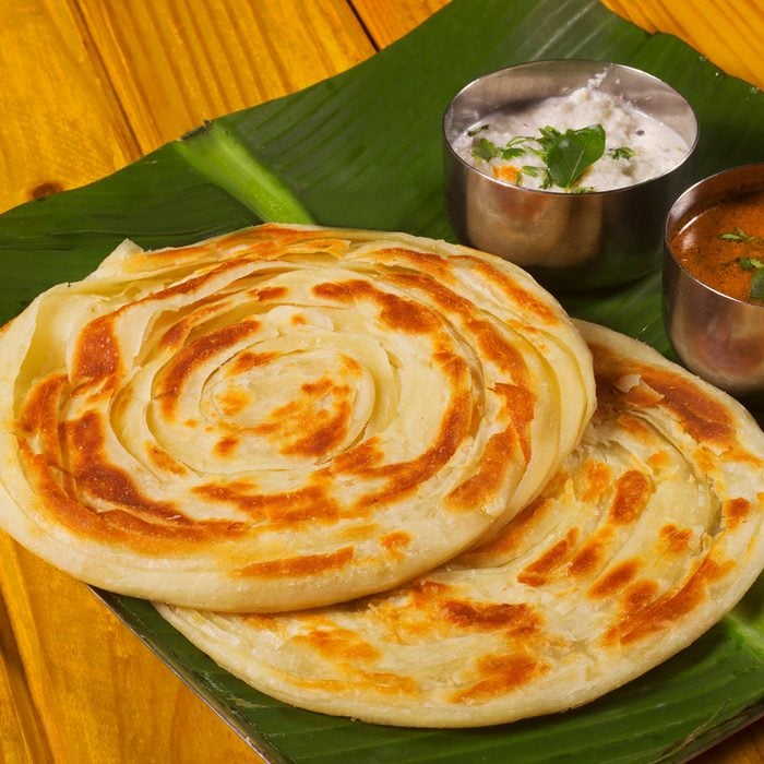 Kerala parotta, popularly known as paratha or porotta, is a delicacy from the state of Kerala