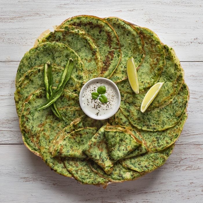 Spinach Adai - Indian green pancakes. Handmade food.