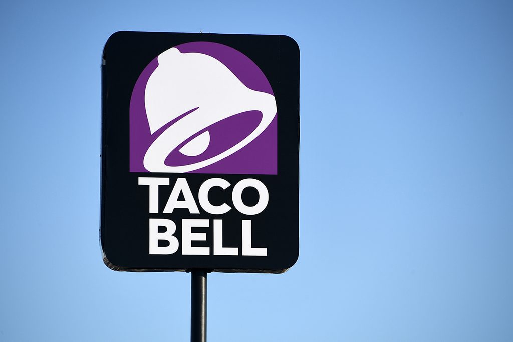 LAS VEGAS, NEVADA - MARCH 30: An exterior view shows a sign at a Taco Bell restaurant on March 30, 2020 in Las Vegas, Nevada. Taco Bell Corp. announced that on March 31, 2020, the company will give everyone in the country one free beef nacho cheese Doritos Locos Taco, no purchase necessary, to drive-thru customers at participating locations while supplies last as a way of thanking people who are helping their communities in the wake of the coronavirus pandemic. The company also announced it would relaunch its Round Up program, which gives customers the option to "round up" their order total to the nearest dollar, to raise funds for the No Kid Hungry campaign. The Taco Bell Foundation will also be donating $1 million dollars to the campaign. (Photo by Ethan Miller/Getty Images)