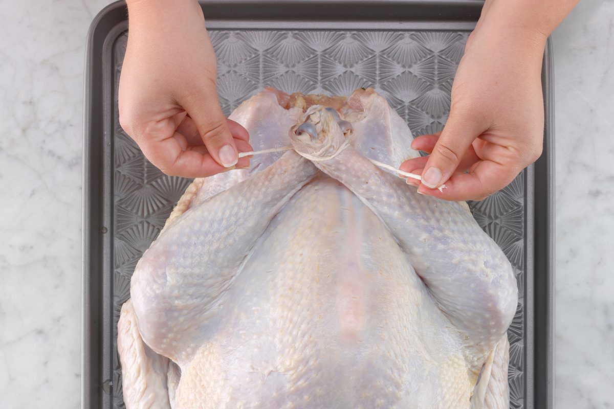 74640 Herb-Brined Turkey; 3 How-to Cook Turkey (tying legs/raw turkey)