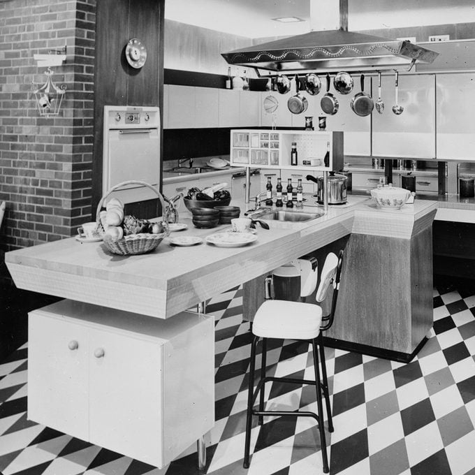 November 1956: General Electric's modern kitchen 'Gourmet's Delight'; all the appliances are grouped together for convenience and the position of the work surfaces has been carefully considered. (Photo by Keystone Features/Getty Images)