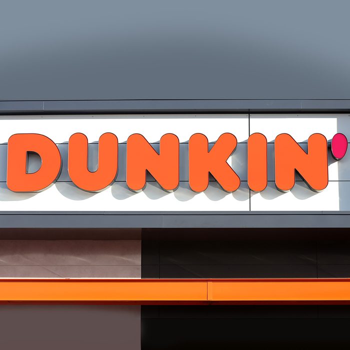 QUINCY, MA - JANUARY 16: A sign outside the new Dunkin' store in Quincy, MA is pictured on Jan. 16, 2018. The famed local chain debuted the new store with "Donuts" removed from its name. Located about 1 mile from where the first one opened in Quincy 68 years ago, this one is decidedly more modern, with an open layout and more natural lighting, a grab-and-go station with healthier options, pickup stations for orders via the mobile app, and eventually, digital kiosks for ordering. (Photo by David L. Ryan/The Boston Globe via Getty Images)