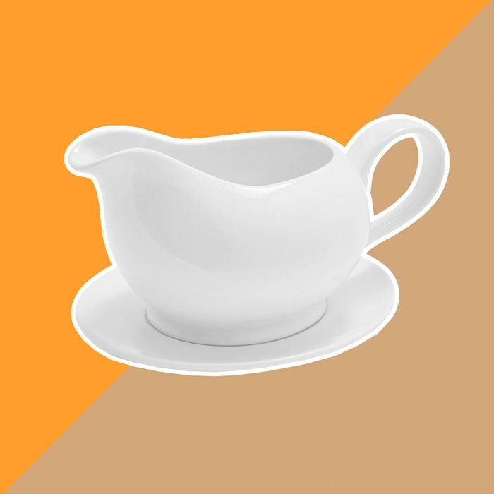 PORCELAIN GRAVY BOAT WITH SAUCER