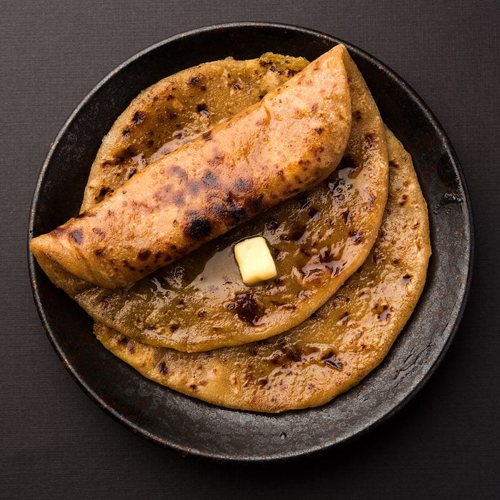 Puran Poli / Puranpoli / Holige / Obbattu - Indian sweet flatbread, selective focus
