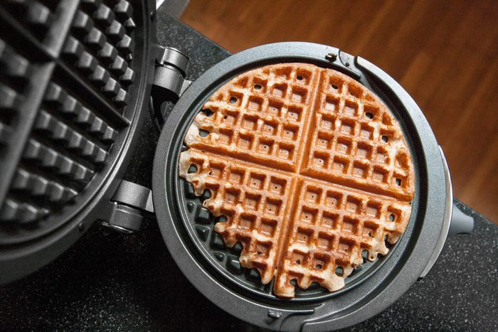 Waffle Maker with a waffle in it