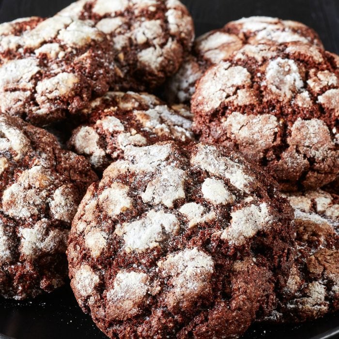 A pile of sugar-free, keto chocolate crinkle cookies.