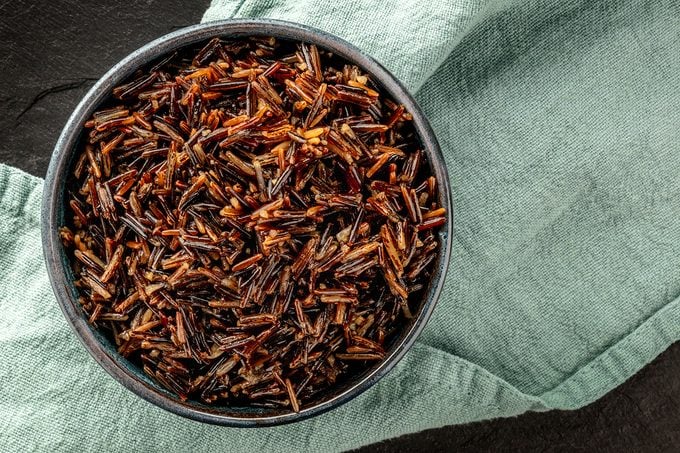 Wild Black Rice, Shot From Above On A Dark Background With Copy Space