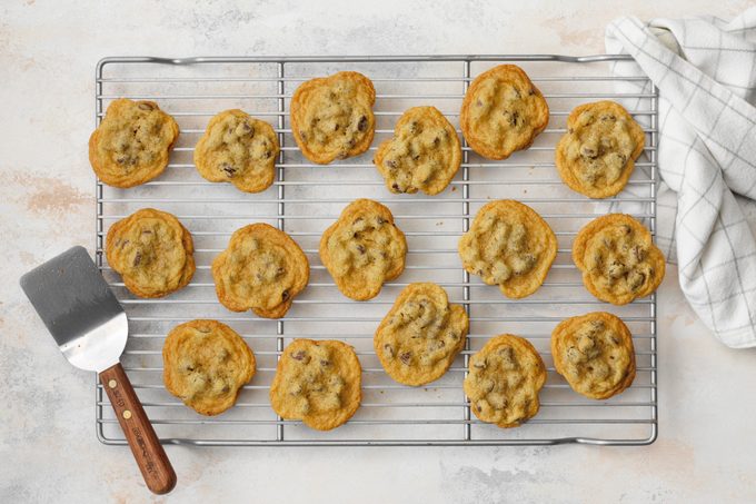 Gluten Free Chocolate Chip Cookies set on a metal rack to cool