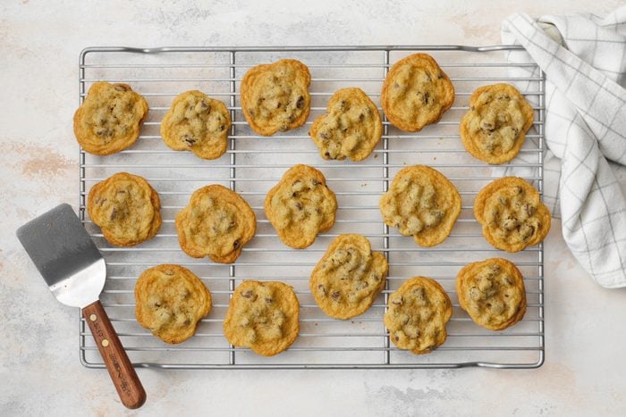 Gluten Free Chocolate Chip Cookies set on a metal rack to cool