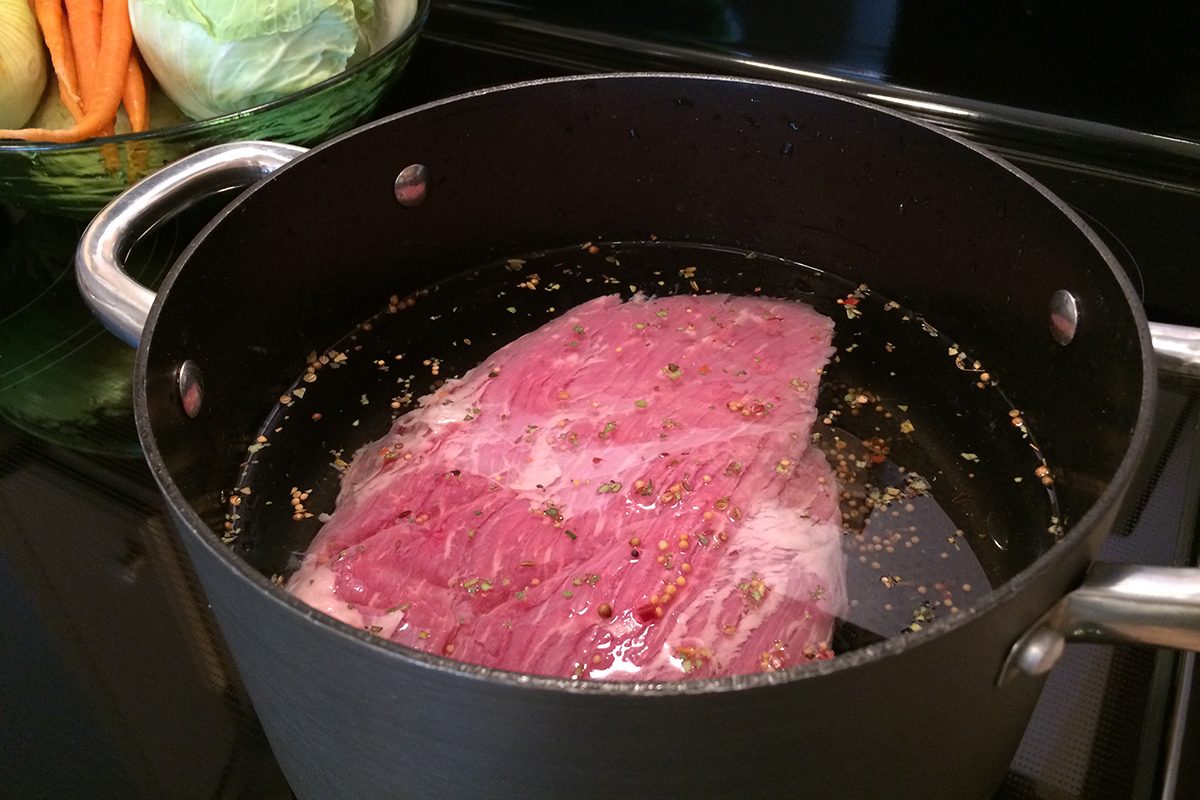 Corned Beef & Cabbage Prep With Pot, Meat & Vegetables For Traditional St. Patrick's Day Meal