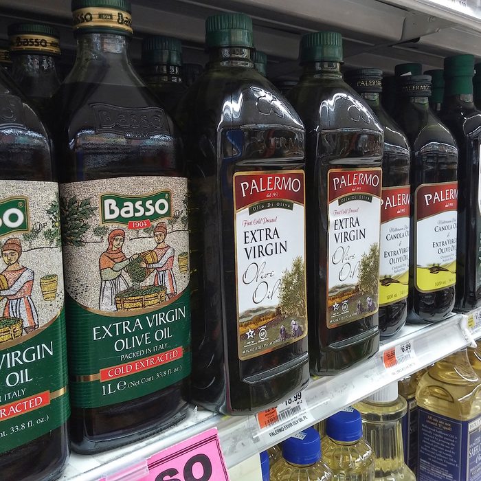 healthy oils Bottles of imported olive oil and olive oil blends are seen on a supermarket shelf in New York on Monday, March 21, 2016. (© Richard B. Levine) (Photo by Richard Levine/Corbis via Getty Images)