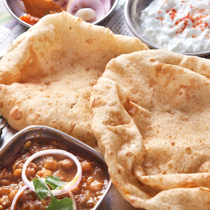 indian main dishes Close Up Chole Bhature Served At Table