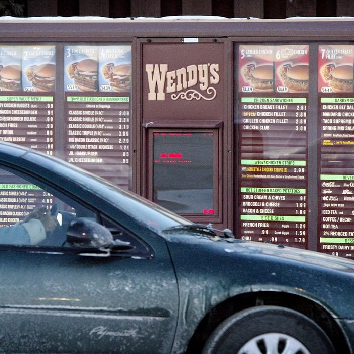 wendy's baked potato CHICAGO, IL - JANUARY 30: 30: A customer orders from the drive-up menu at a Wendy's restaurant January 30, 2004 in Chicago, Illinois. Wendy's, the nation's third largest hamburger chain, announced today a sharp increase in fourth- quarter profits. (Photo by Scott Olson/Getty Images)