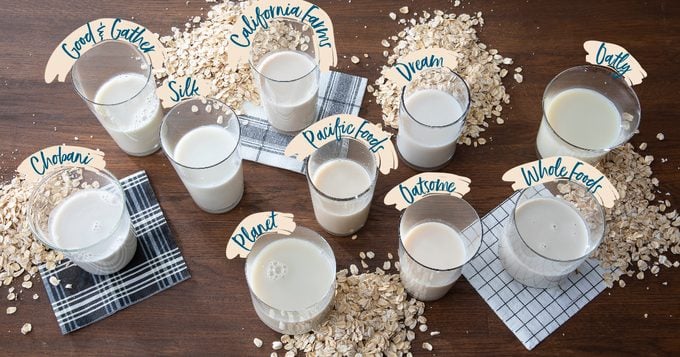 Oat Milks On Counter In Containers