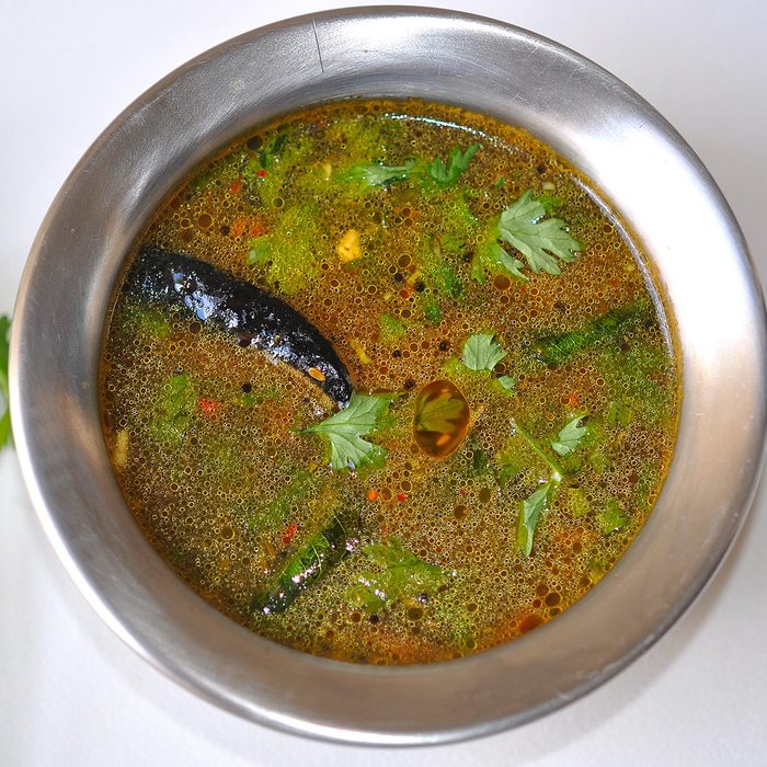 indian main dishes Rasam or chaaru or saaru is a south indian tradiotional soup, prepared using tamarind juice with the addition of tomato, chili, pepper, cumin and other spices as seasonings. Garnished with coriander leaves.It is eaten with rice or separately as a spicy soup. Part of the meal in south indian states of Tamil Nadu, Andra and Karnataka.