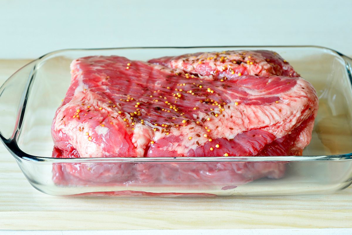 Fresh corned beef in a glass pan on Patrick day