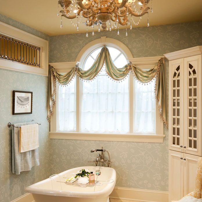 Warm traditional styled master bath with clawfoot Gettyimages 155385265