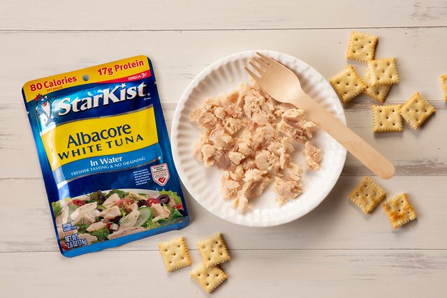 Overhead Shot Of Starkist Tuna In Package And On Plate With Fork And Crackers