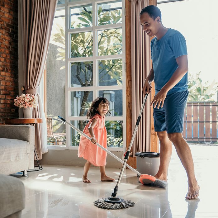 Little Girl Help Her Daddy To Do Chores