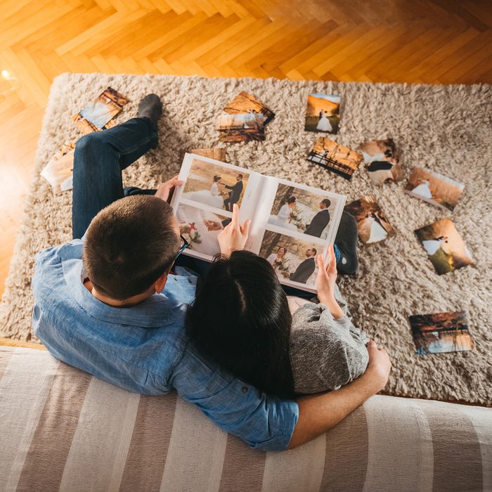 Looking At Wedding Photos