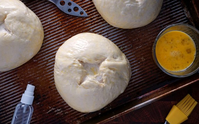 after a second rise, score the bread bowls, brush with egg wash and spray with water copycat panera bread bowl