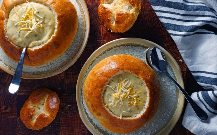 finished copycat panera bread bowls filled with cheddar broccoli soup - option 1