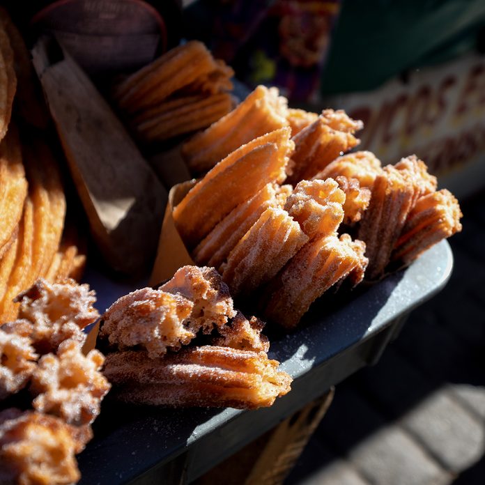 easter traditions around the world Street Vendor Churros Dessert Snack For Sale In A Town Shopping Area In Juarez, Chihuahua, Mexico
