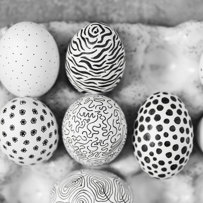 Unusual Painted In Black And White Graphic Style Chicken Eggs For Easter In Gray Ceramic Egg Holder