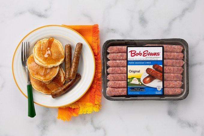 Bob Evans Original Links On Plate With Pancakes And Packaging On Marble.