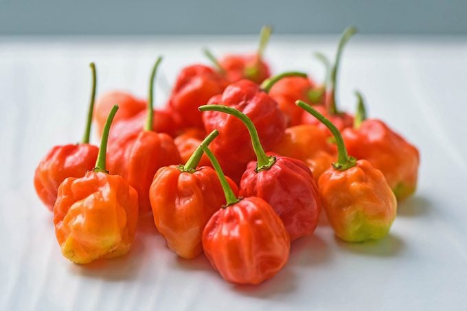 Scotch Bonnet Hot Chilli Peppers On White Background