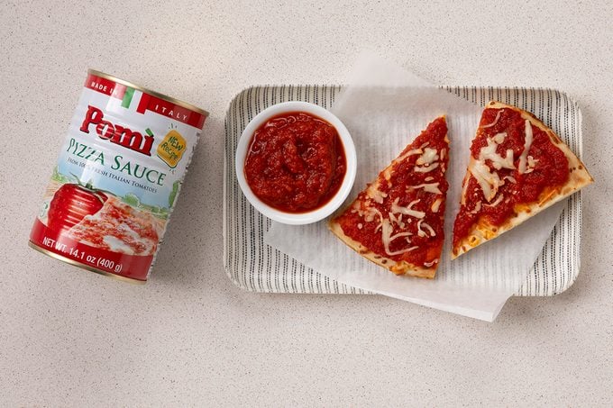 Pomi Pizza Sauce In Can, In Small Bowl And On Pizza