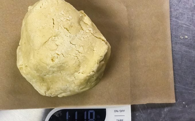 Alfajores Recipe Dough getting weighed before splitting in half