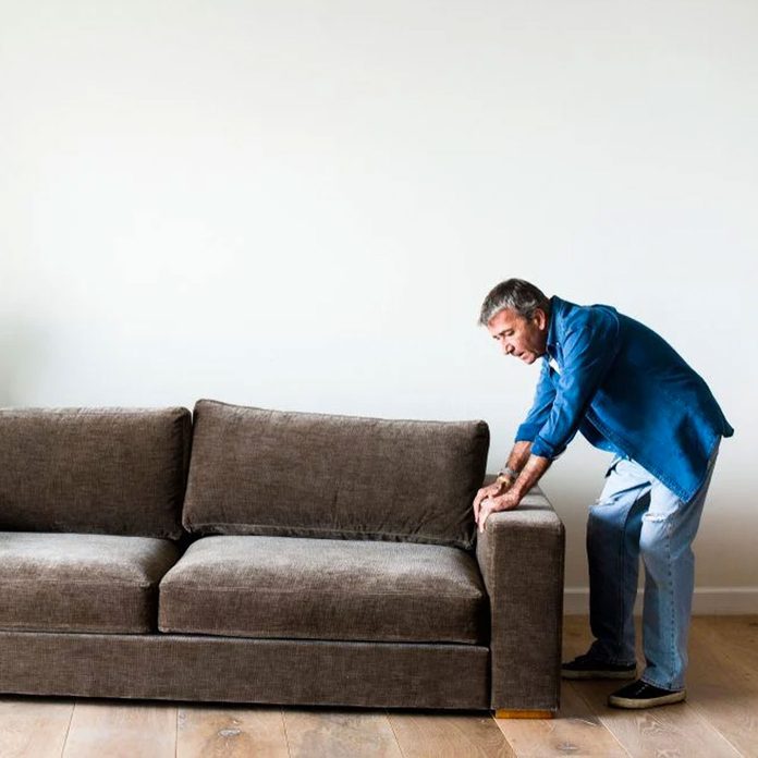 Moving Couch Strain Shutterstock 1230660412
