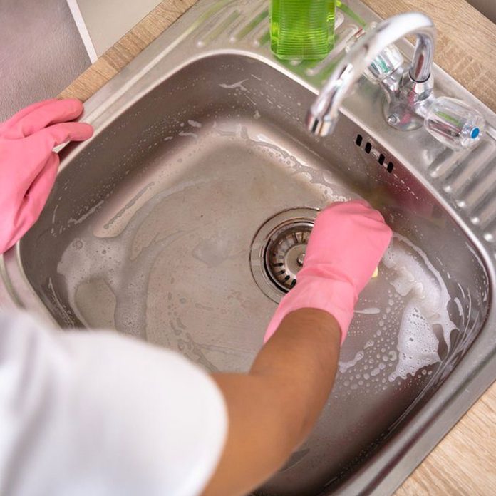 Scrubbing Sink Shutterstock 1295681215