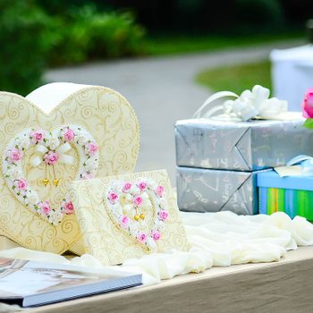 wedding registry Sweet Gift Box Heart Shape On Table For Wedding Day.