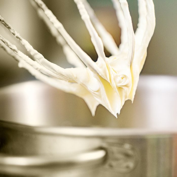 Whipped Cream Hanging On Electric Mixer Whip