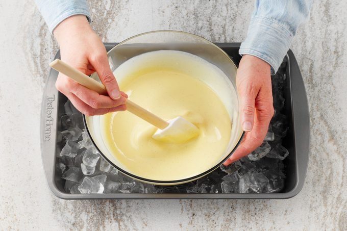 custard cooling in a pan of ice