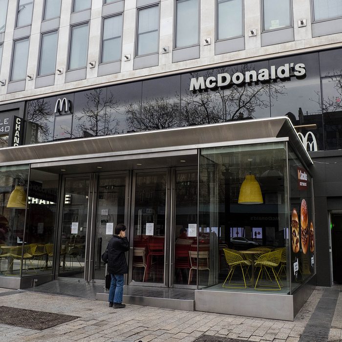 PARIS, FRANCE - MARCH 16: General view of a closed McDonald's restaurant which shows the message "The government requests to close until further notice", at Avenue des Champs Elysees, in the 8th quarter of Paris, as the city imposes emergency measures to combat the Coronavirus COVID-19 outbreak, on March 16, 2020 in Paris, France. French Prime Minister Edouard Philippe announced last Saturday that France must shut shops, restaurants and entertainment facilities to slow down the spread of the coronavirus. Due to a sharp increase in the number of cases of the COVID-19 virus declared in Paris and throughout France, several sporting, cultural and festive events have been postponed or cancelled. The epidemic has exceeded 6,500 dead for more than 169,000 infections across the world. During a televised speech dedicated to the coronavirus crisis on March 16, French President, Emmanuel Macron announced that France starts a nationwide lockdown on March 17. (Photo by Edward Berthelot/Getty Images)
