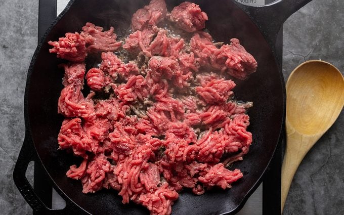 A heat-resistant utensil to break up ground beef, stir sauces