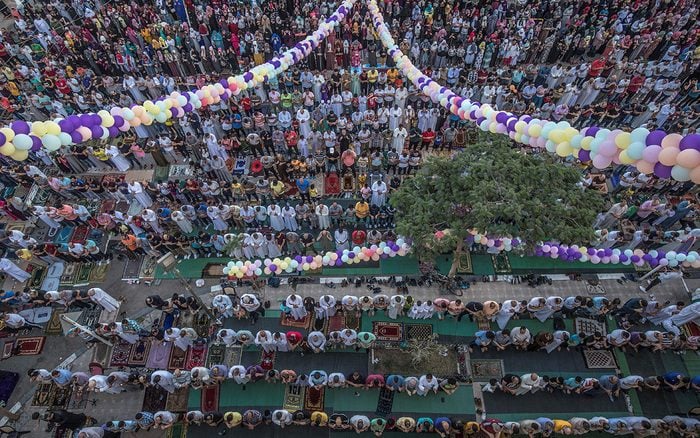 what is eid al ahda Egyptian Muslims perform the Eid Al-Adha morning prayer outside al-Sedik mosque in the northeastern suburb of Sheraton in the capital Cairo,, on August 11, 2019. - Muslims across the world are celebrating the first day of the Feast of Sacrifice, which marks the end of the hajj pilgrimage to Mecca and commemorates prophet Abraham's sacrifice of a lamb after God spared Ishmael, his son. (Photo by Khaled DESOUKI / AFP) (Photo credit should read KHALED DESOUKI/AFP via Getty Images)