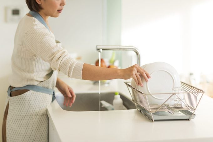 Housewife Washing Dishes