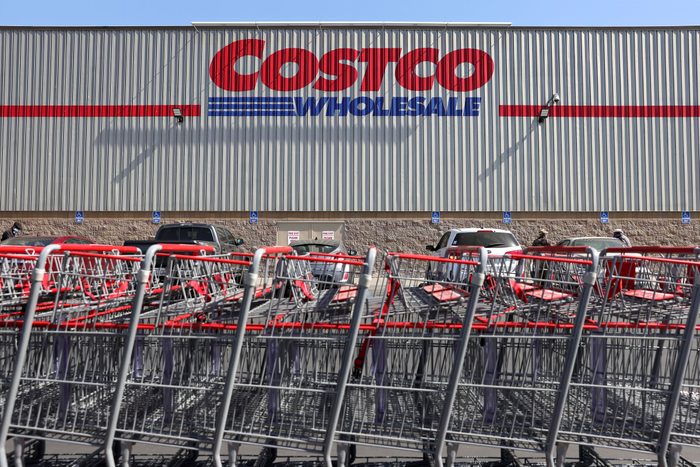 Shopping carts are lined up in front of a Costco store on February 25, 2021 in Inglewood, California.