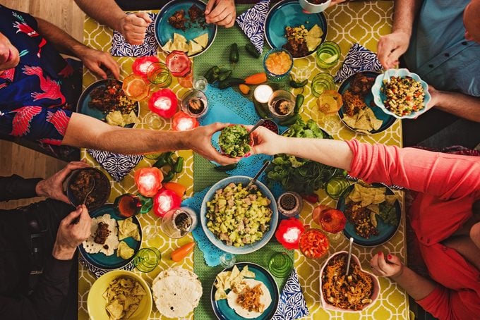 Friends having a Mexican tex mex dinner